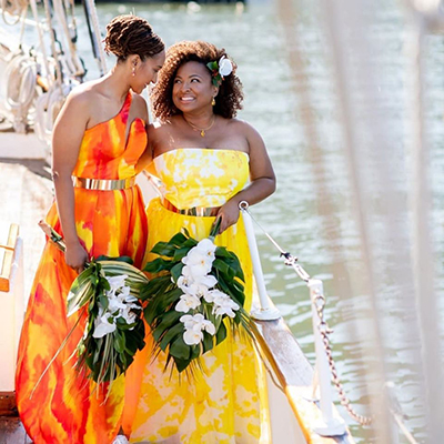 Two ladies on Yacht in Hand Dyed Silk dresses, wedding
