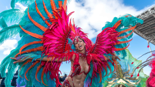 Female masquerader in front line Carnival costume