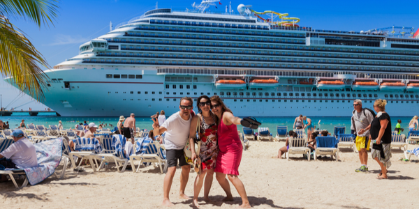 Three tourists taking a selfie on the dock at Grand Turk, Turks and Caicos